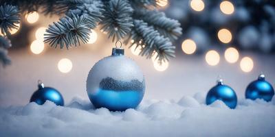 The primary subject of the image is a blue and white Christmas ornament. The ornament is hanging from a tree, which is covered in snow. The setting is a wintery environment, with the ornament being the main focus of the image. The visual style is a photo, capturing the ornament in its natural surroundings. The colors and mood of the image are predominantly blue and white, creating a festive and cold atmosphere.